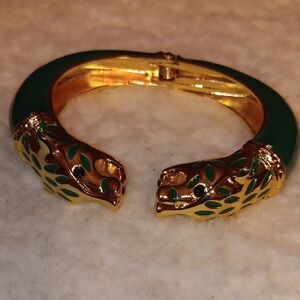 Elegant Gold and Green Panther Bracelet